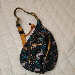 Kavu Sling Bag with Black and Yellow Woodlands Animal Design